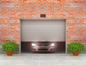 Garage opens on brick building