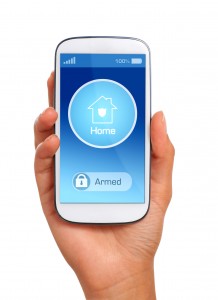hand holding phone with smarthome security app